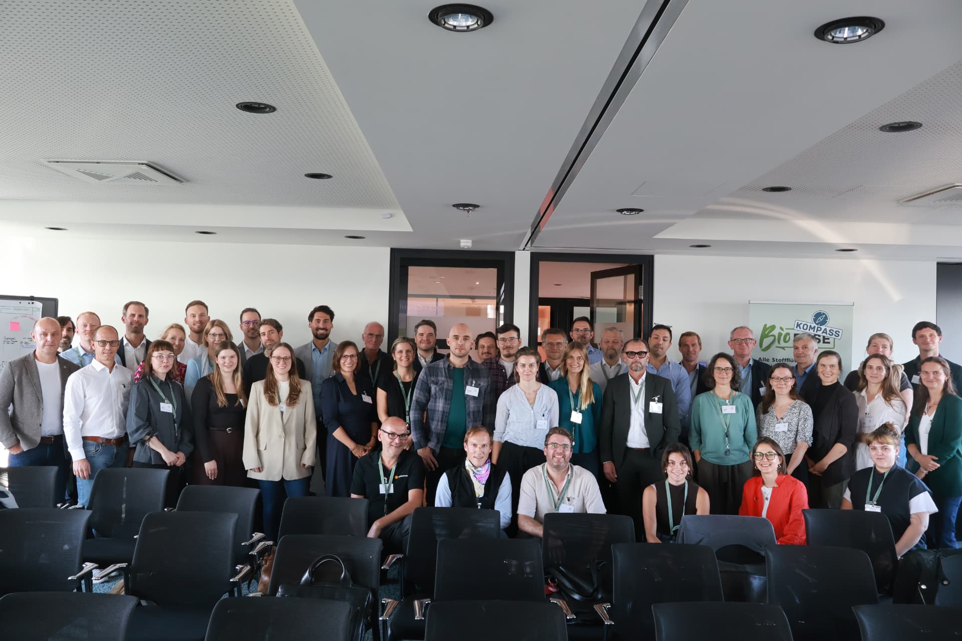 Group photo of the ReTraCC consortium in a seminar room