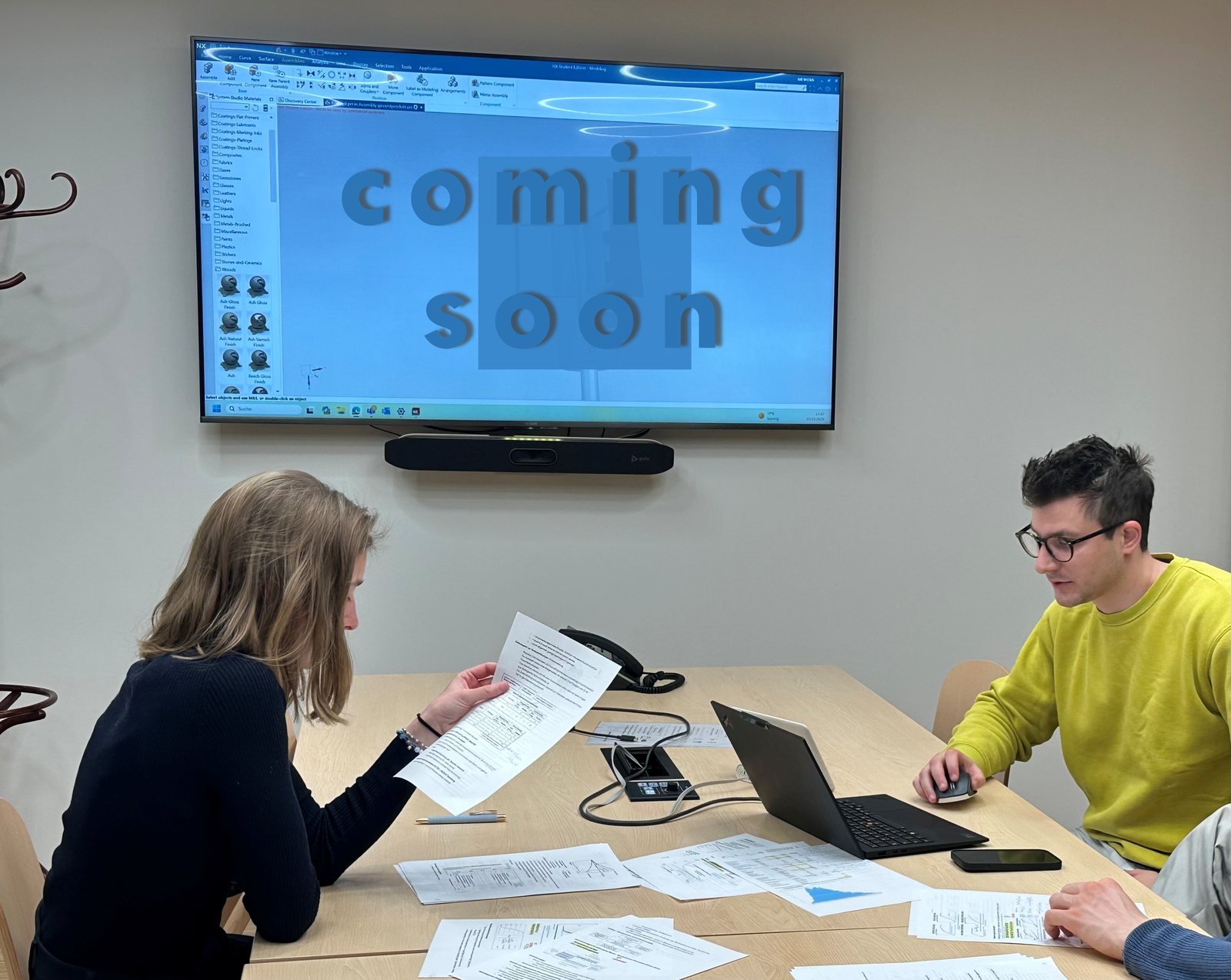 AeroVia team working with technical documents.